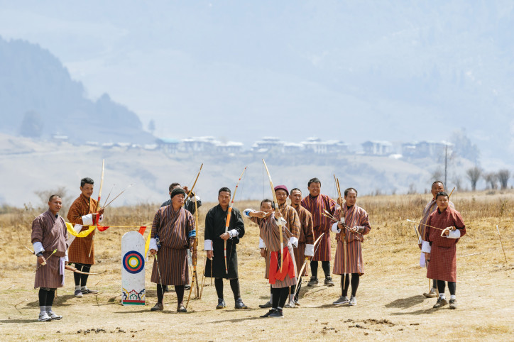 Archery (‘dha’) is the national sport of Bhutan. A tournament in Phobjikha Valley. Photo by Andrew Peacock/Getty Images